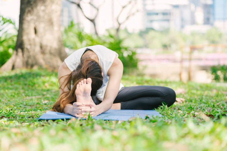 a woman practicing Yoga